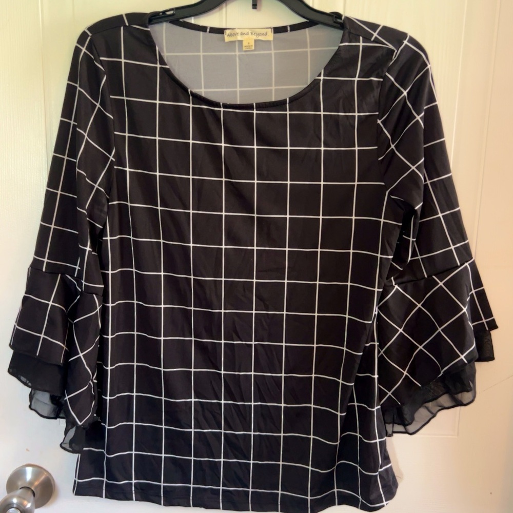 Black and white bell sleeve top